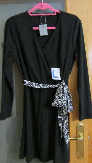 Vestido negro , Jersey marfil, y dos faldas