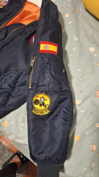 Cazadora bomber niño azul naranja talla 9/10