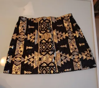 Falda mini lentejuelas negra y dorada