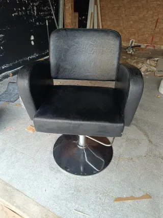 Sillón de peluquería está nuevo negociable