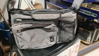 Bolso organizador para silla de bebé.