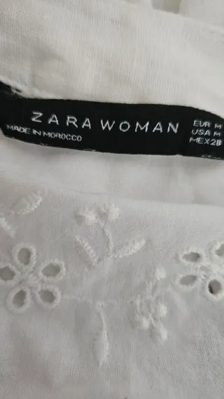 Blusa blanca con vuelos