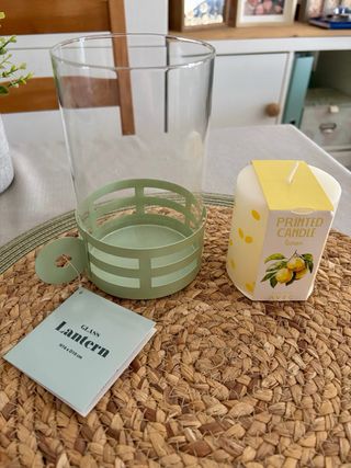 Farol de cristal y metal con vela