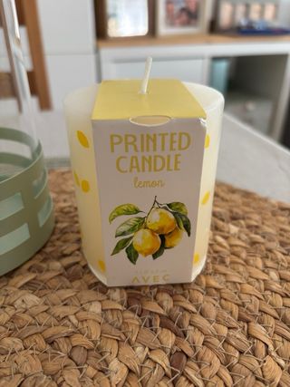 Farol de cristal y metal con vela