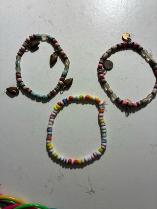 Set di bracciali e collane varie