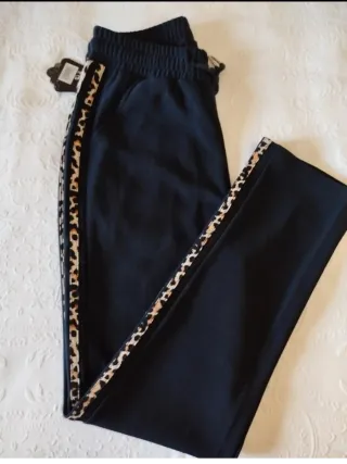 Pantaloni tuta donna neri con banda leopardata