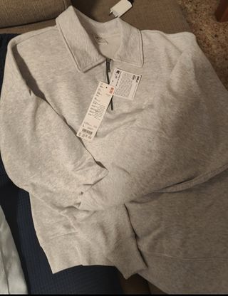 Sudadera UNIQLO gris cuello polo talla L