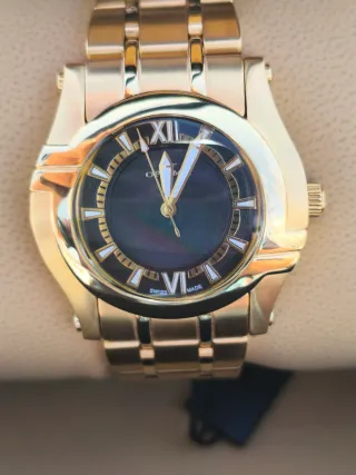 Reloj Optima Negro y Dorado Mujer Negociable