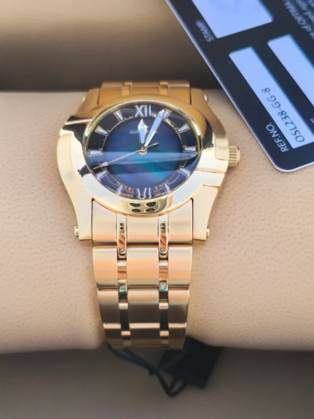 Reloj Optima Negro y Dorado Mujer Negociable