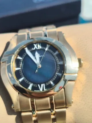 Reloj Optima Negro y Dorado Mujer Negociable