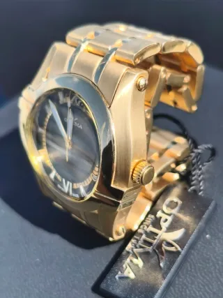 Reloj Optima Negro y Dorado Mujer Negociable