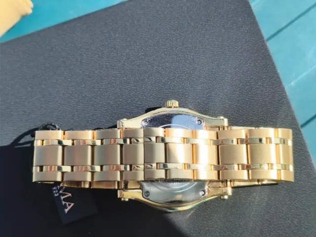 Reloj Optima Negro y Dorado Mujer Negociable