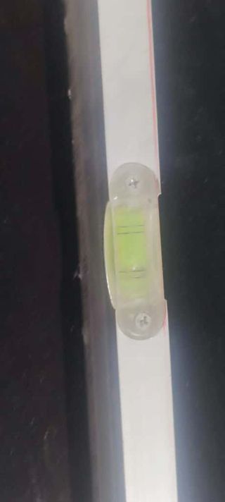 Nivel de burbuja con regla