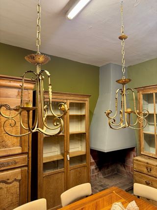 Coppia di lampade antiche in ferro battuto. Pan di Oro