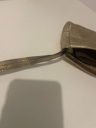 Pochette in pelle color oro