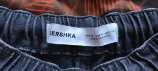 Pantalones vaqueros negros rotos