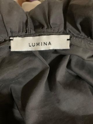 Camicia body nera elegante con rouches Lumina