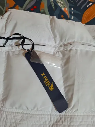 Piumino lungo smanicato bianco nuovo