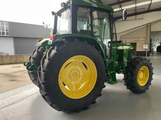 Tractor John Deere 6310 con pala