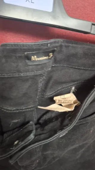 Vaqueros negros Massimo Dutti tachuelas