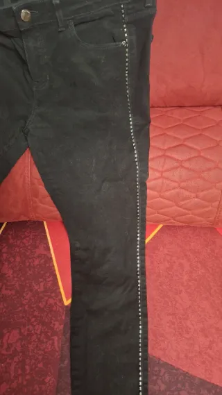 Vaqueros negros Massimo Dutti tachuelas