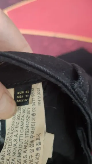 Vaqueros negros Massimo Dutti tachuelas