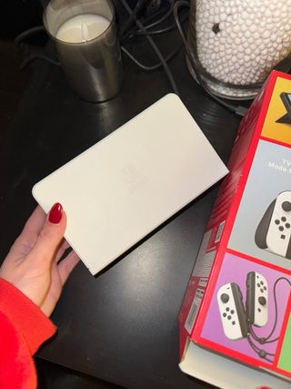 Nintendo Switch OLED Nera e Bianca con accessori