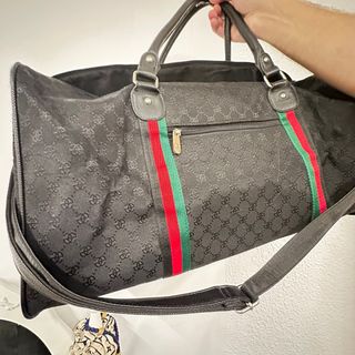 Bolsa de viaje Gucci negra
