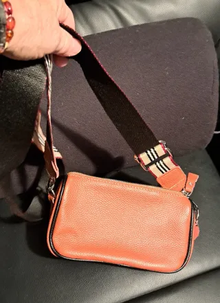Pochette in pelle arancione