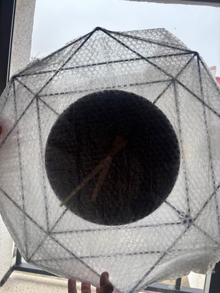 Reloj moderno negro y plateado