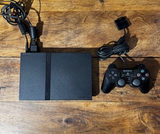 PS2 Slim Sony Negra con Mando y Cables