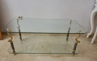 Mesa de centro cristal y metal dorado