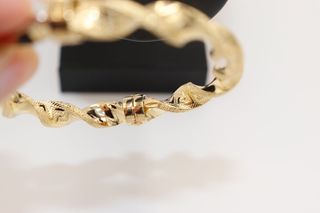 PULSERA RIGIDA RIZADA CON GRECA GRAZIELLA 18K