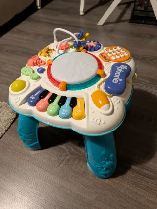 Mesa de juegos musical para bebé