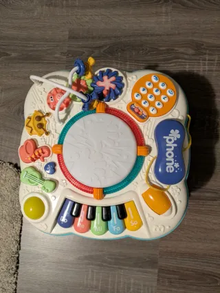 Mesa de juegos musical para bebé