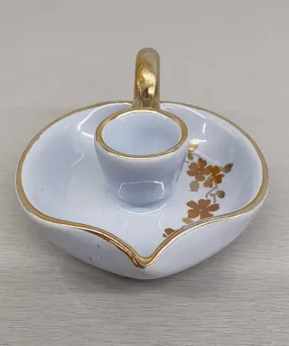 Porta candela in porcellana con manico dorato