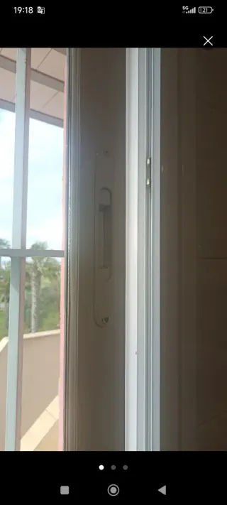 Ventana Climalit con persiana y mosquitera