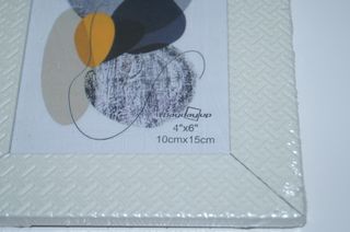 Moldura para fotos bege com padrão