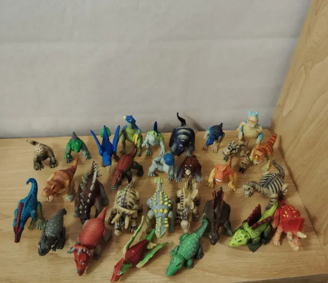 Colección 28 Mini Dinosaurios. Articulados .