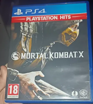 PS4 Slim, con juegos y dos mandos