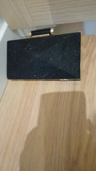 Bolso de fiesta negro y dorado