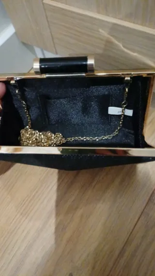 Bolso de fiesta negro y dorado