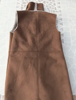 Chaleco imitación piel vuelta