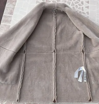 Chaleco imitación piel vuelta