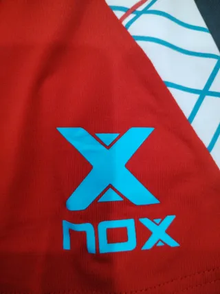 Conjunto de pádel rojo y blanco