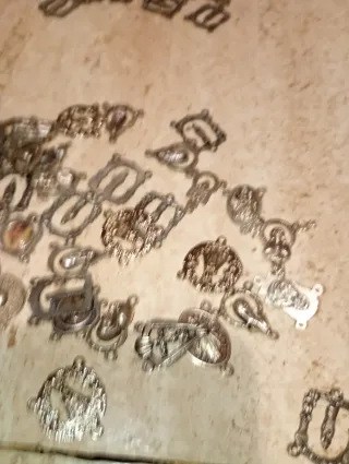 Medaglie per collane e bracciali