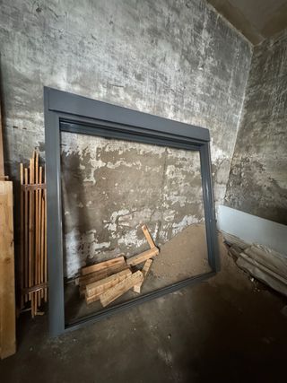 Ventanal corredero antracita con persiana