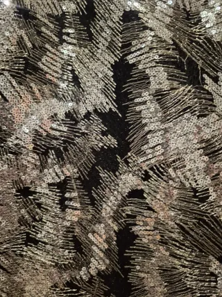 Top lentejuelas negro y plateado