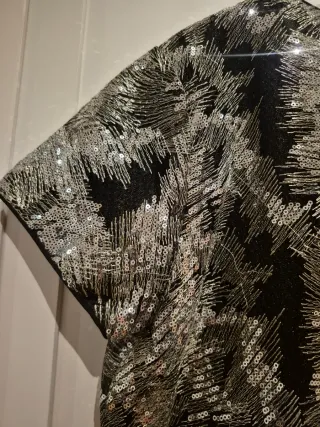 Top lentejuelas negro y plateado