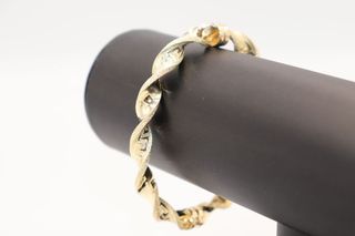 PULSERA RIGIDA RIZADA CON GRECA GRAZIELLA 18K